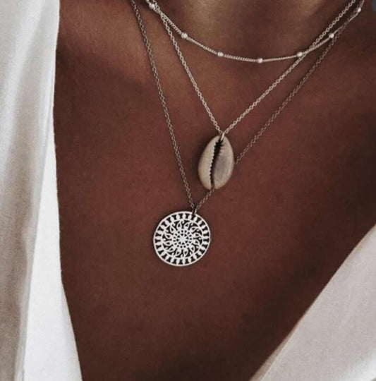https://www.artistryjewelry.net/products/silver-shell-multilayer-necklace