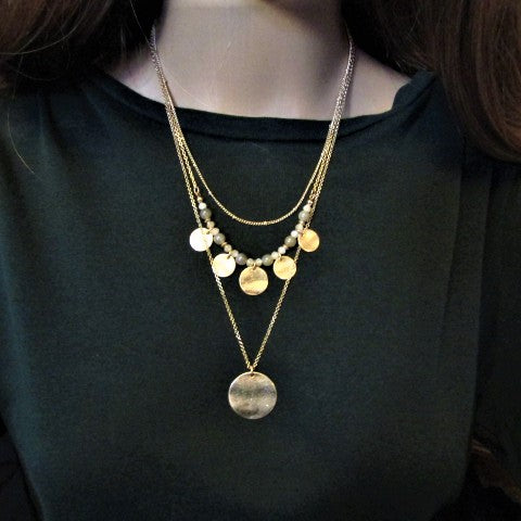 https://www.artistryjewelry.net/products/lovely-beige-multi-strand-necklace