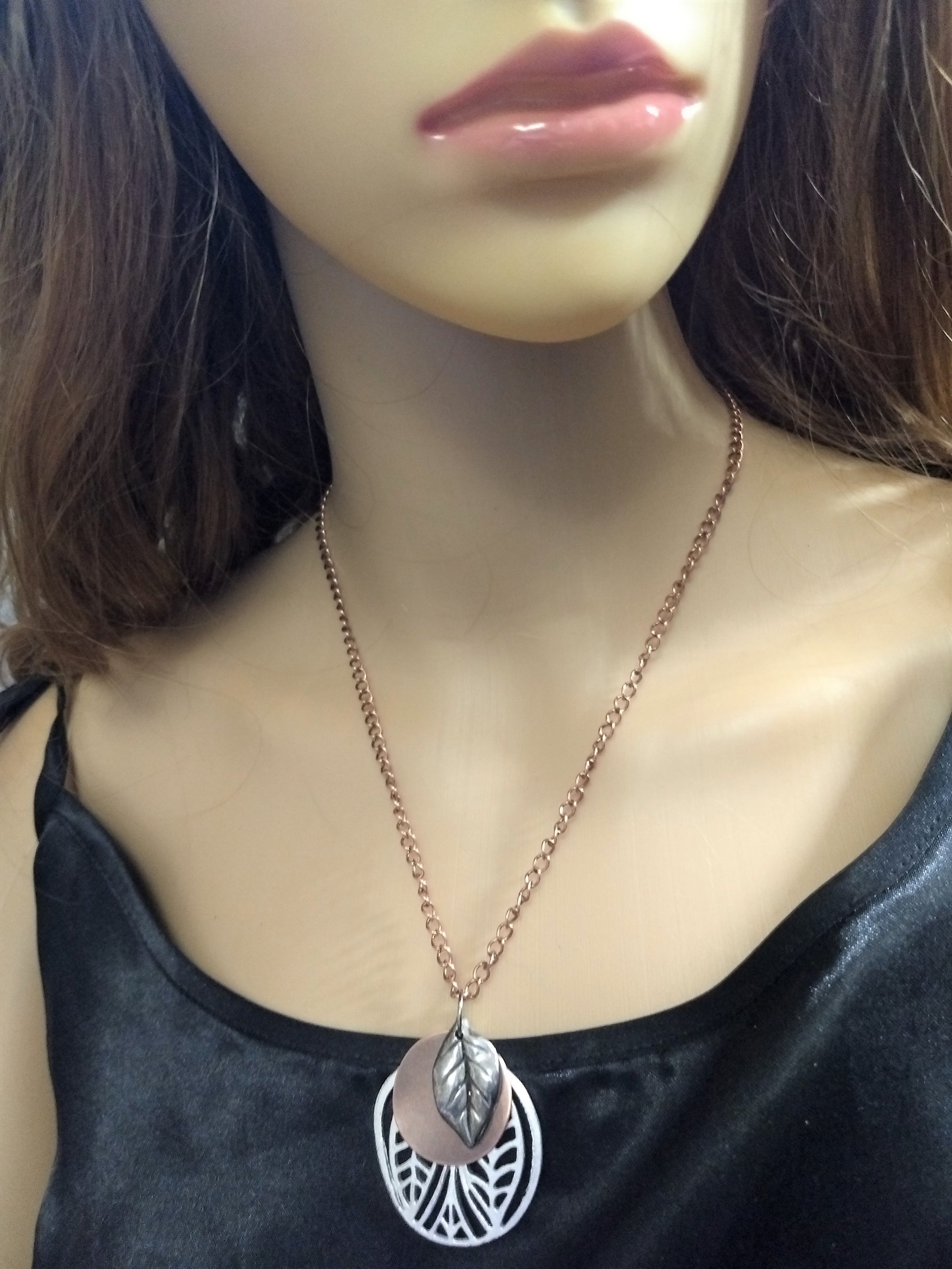 https://www.artistryjewelry.net/products/charming-copper-leaves-necklace-set