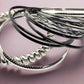 https://www.artistryjewelry.net/products/silver-and-black-bangle-bracelet