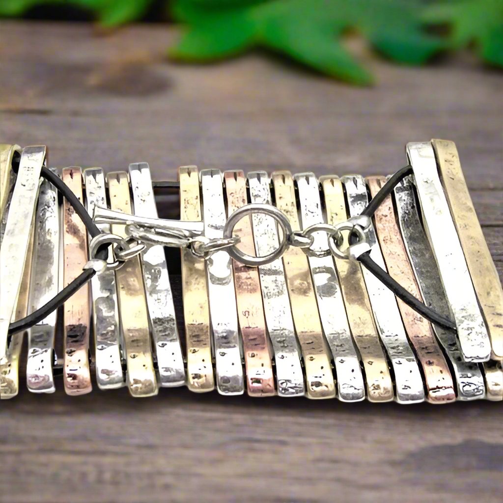 https://www.artistryjewelry.net/products/aged-finished-metal-bracelet