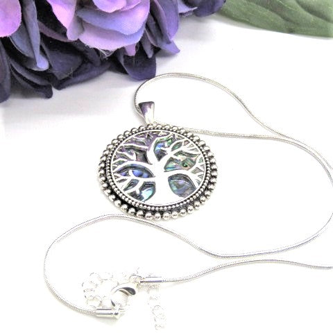 https://www.artistryjewelry.net/products/abalone-tree-of-life-pendant-necklace