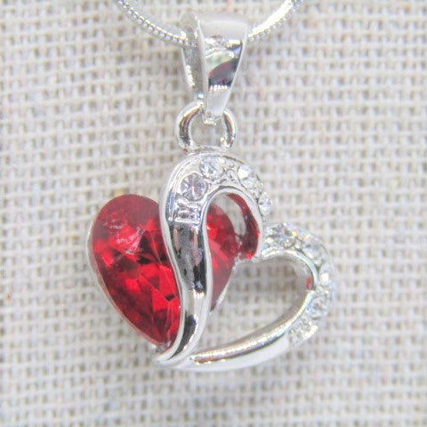 https://www.artistryjewelry.net/products/red-crystal-heart-necklace
