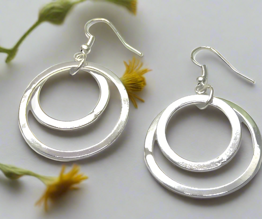https://www.artistryjewelry.net/products/fantastic-silver-circle-earrings