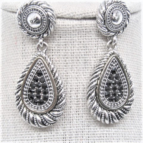 https://www.artistryjewelry.net/products/silver-swirl-earrings