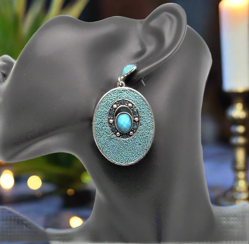 https://www.artistryjewelry.net/products/teal-earrings