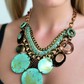 https://www.artistryjewelry.net/products/green-patina-dangle-necklace-set