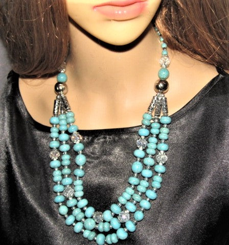 https://www.artistryjewelry.net/products/turquiose-and-silver-necklace-set