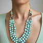 https://www.artistryjewelry.net/products/turquiose-and-silver-necklace-set