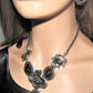 https://www.artistryjewelry.net/products/black-and-silver-flower-necklace-set