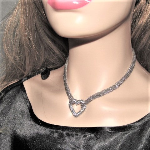 https://www.artistryjewelry.net/products/multi-chain-pave-heart-necklace