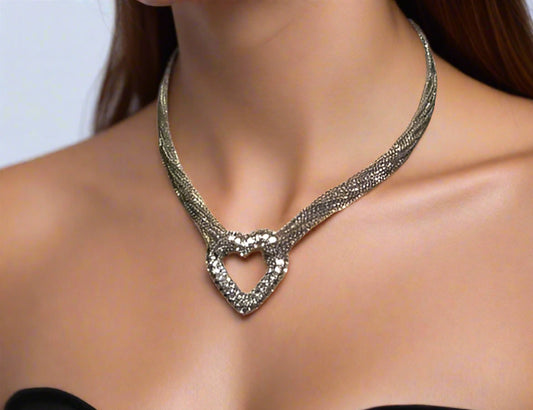 https://www.artistryjewelry.net/products/multi-chain-pave-heart-necklace