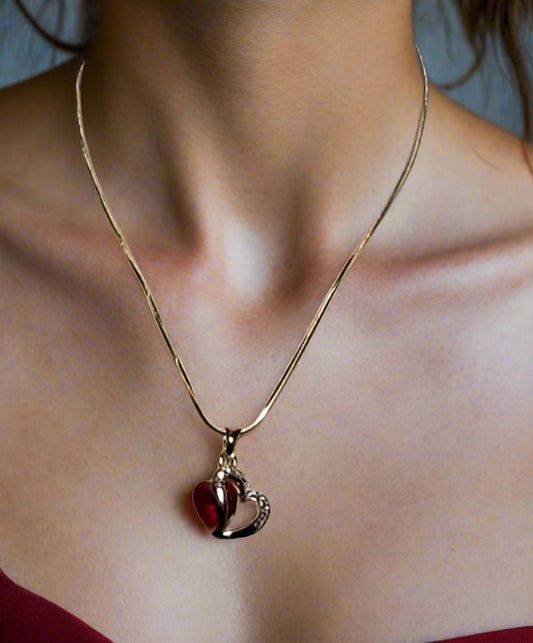 https://www.artistryjewelry.net/products/red-crystal-heart-necklace