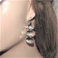 https://www.artistryjewelry.net/products/multi-disc-drop-earrings