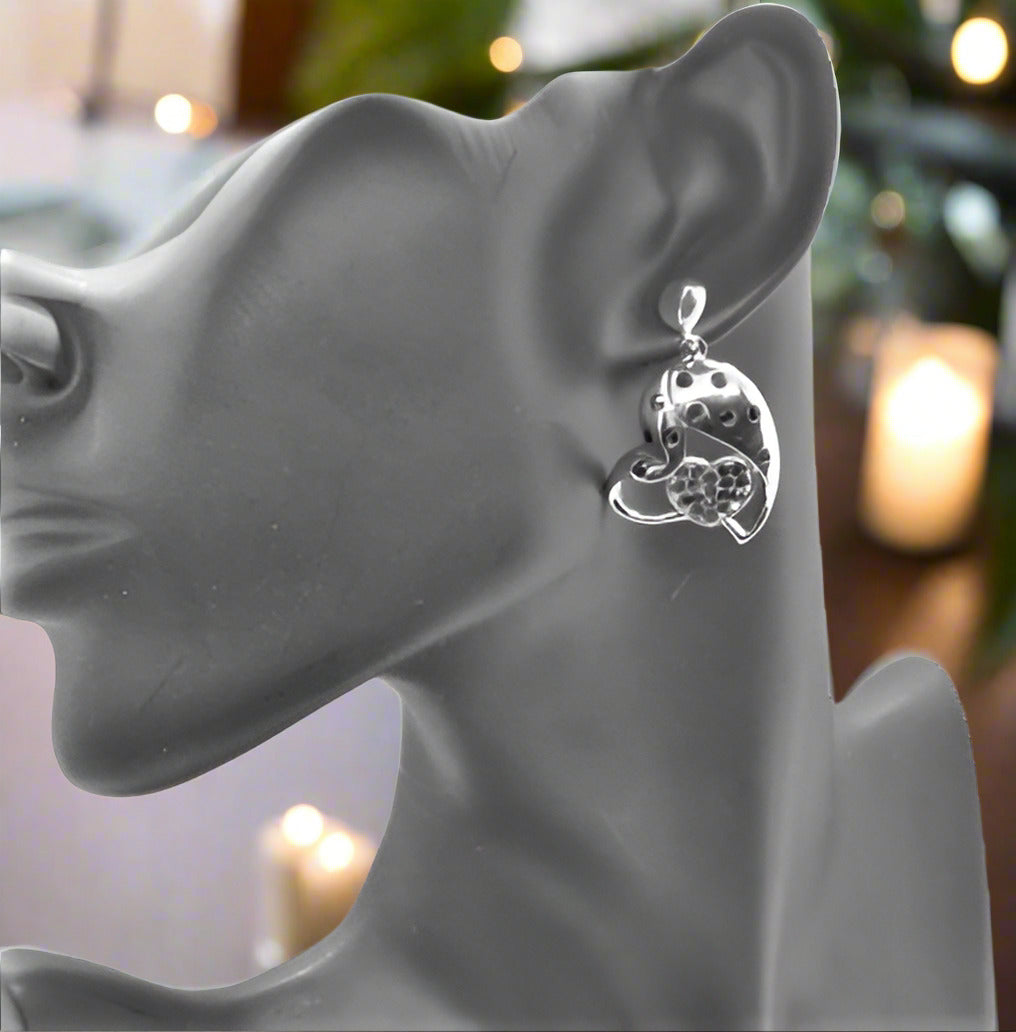 https://www.artistryjewelry.net/products/double-crystal-heart-earrings