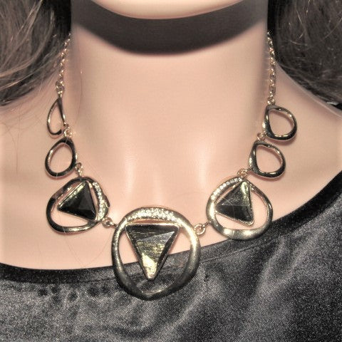 https://www.artistryjewelry.net/products/rings-and-triangles