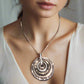 https://www.artistryjewelry.net/products/fantastic-hammered-circles-necklace-set