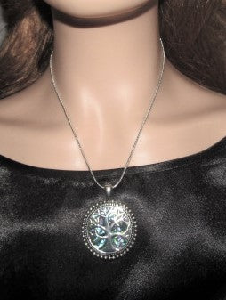 https://www.artistryjewelry.net/products/abalone-tree-of-life-pendant-necklace