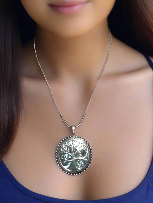 https://www.artistryjewelry.net/products/abalone-tree-of-life-pendant-necklace
