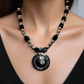 https://www.artistryjewelry.net/products/stunning-silver-and-black-necklace-set
