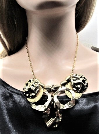 https://www.artistryjewelry.net/products/beautiful-circles-of-gold-necklace