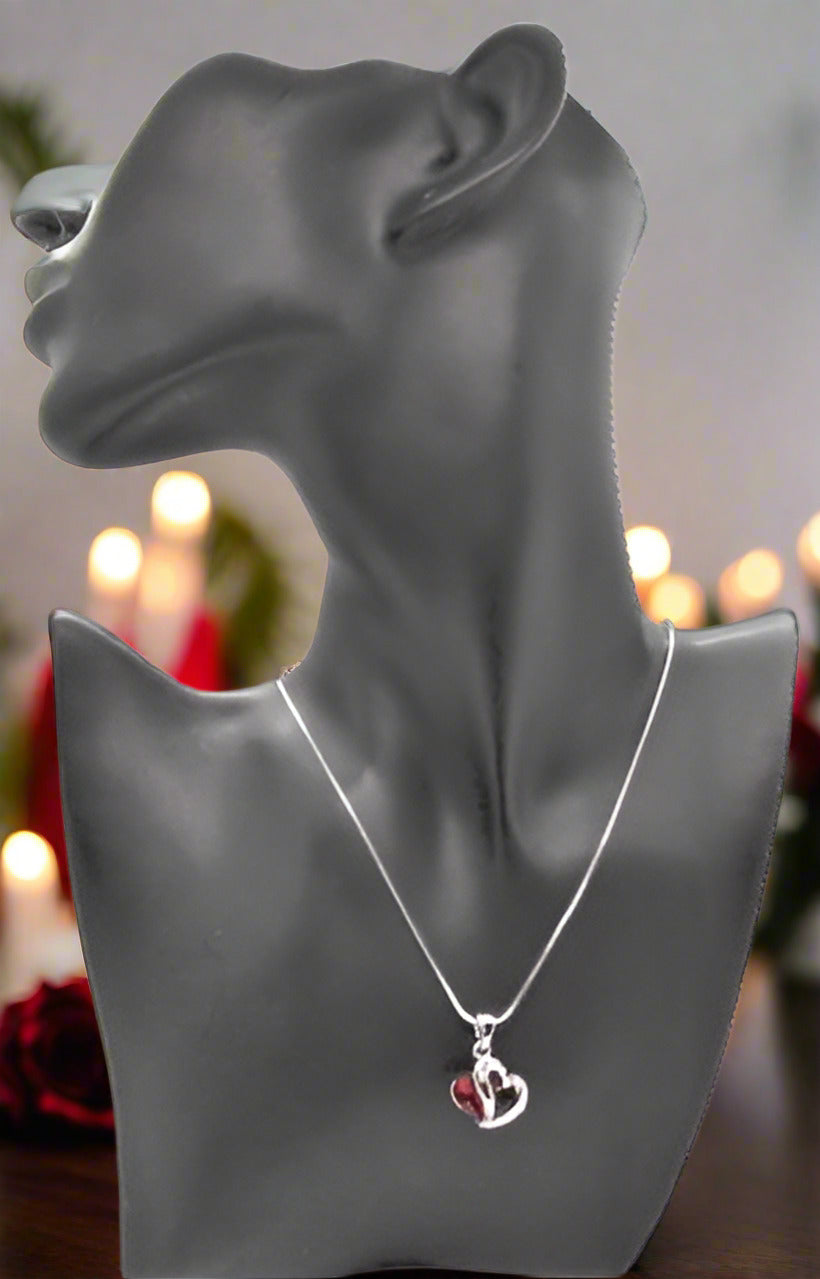 https://www.artistryjewelry.net/products/red-crystal-heart-necklace