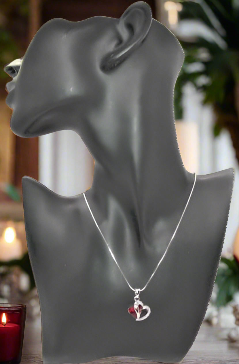 https://www.artistryjewelry.net/products/red-crystal-heart-necklace