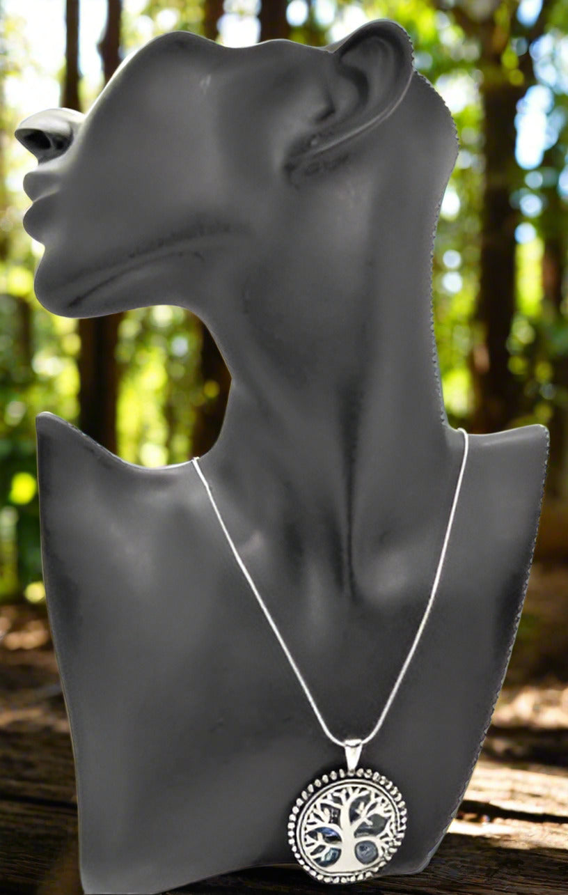 https://www.artistryjewelry.net/products/abalone-tree-of-life-pendant-necklace