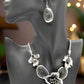 https://www.artistryjewelry.net/products/black-and-silver-flower-necklace-set