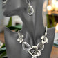 https://www.artistryjewelry.net/products/black-and-silver-flower-necklace-set