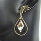 https://www.artistryjewelry.net/products/swarvorski-golden-shadow-earrings