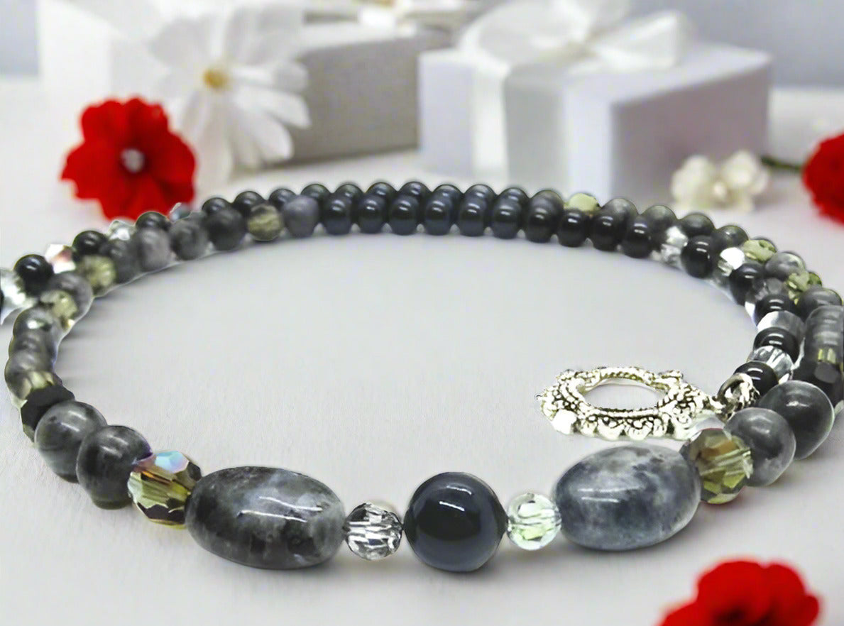 https://www.artistryjewelry.net/products/copy-of-fabulous-black-gray-reflection-a-necklace
