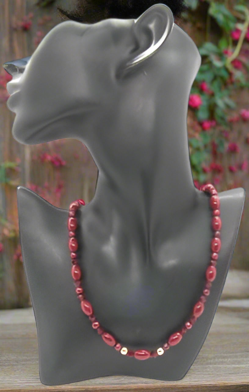 https://www.artistryjewelry.net/products/lovely-burgundy-surprise-necklace