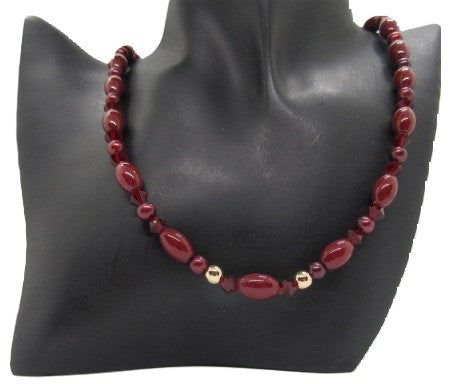 https://www.artistryjewelry.net/products/lovely-burgundy-surprise-necklace