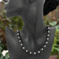 https://www.artistryjewelry.net/products/flaunting-silver-flower-necklace