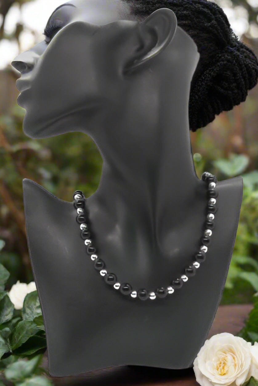https://www.artistryjewelry.net/products/flaunting-silver-flower-necklace