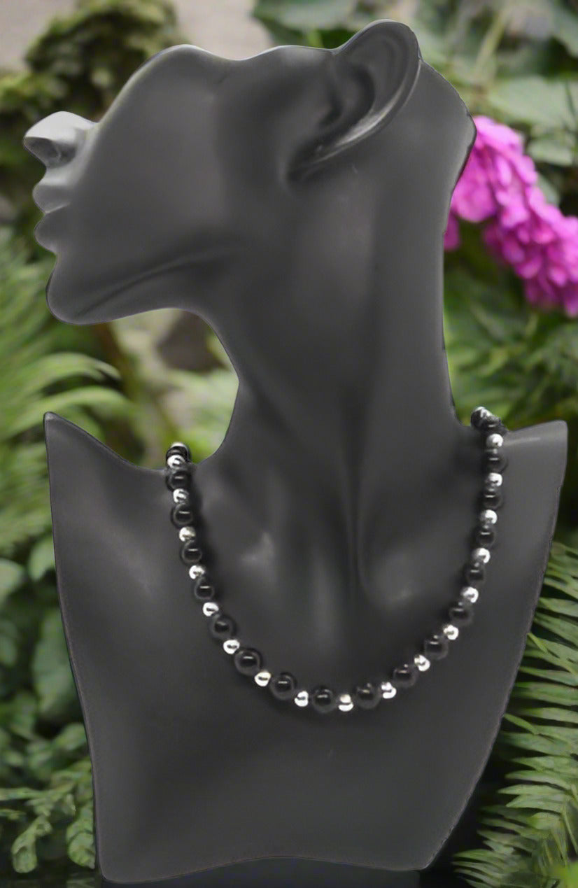 https://www.artistryjewelry.net/products/flaunting-silver-flower-necklace