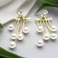 https://www.artistryjewelry.net/products/crystal-and-pearl-hanging-ear-jackets