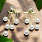 https://www.artistryjewelry.net/products/crystal-and-pearl-hanging-ear-jackets