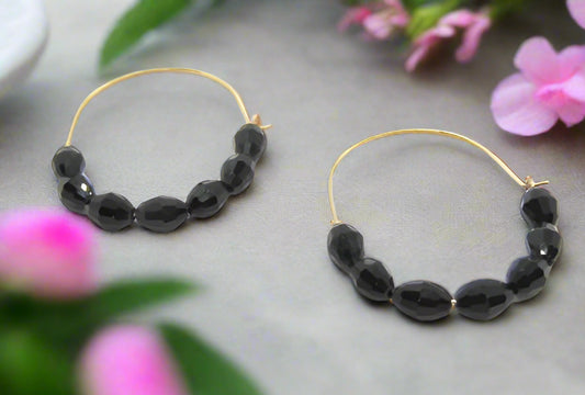 https://www.artistryjewelry.net/products/black-wire-hoop-earrings