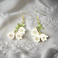 https://www.artistryjewelry.net/products/precious-white-flower-dangle-earrings