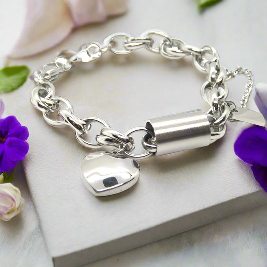 https://www.artistryjewelry.net/products/exciting-silver-heart-and-chain-bracelet