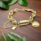 https://www.artistryjewelry.net/products/exciting-puffy-gold-heart-charm-chain-bracelet