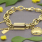 https://www.artistryjewelry.net/products/exciting-puffy-gold-heart-charm-chain-bracelet