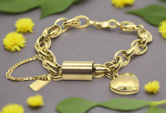 https://www.artistryjewelry.net/products/exciting-puffy-gold-heart-charm-chain-bracelet