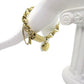 https://www.artistryjewelry.net/products/exciting-puffy-gold-heart-charm-chain-bracelet