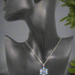 https://www.artistryjewelry.net/products/lovely-blue-winter-snowflake-necklace