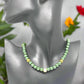 https://www.artistryjewelry.net/products/stunning-olive-green-and-hematite-necklace