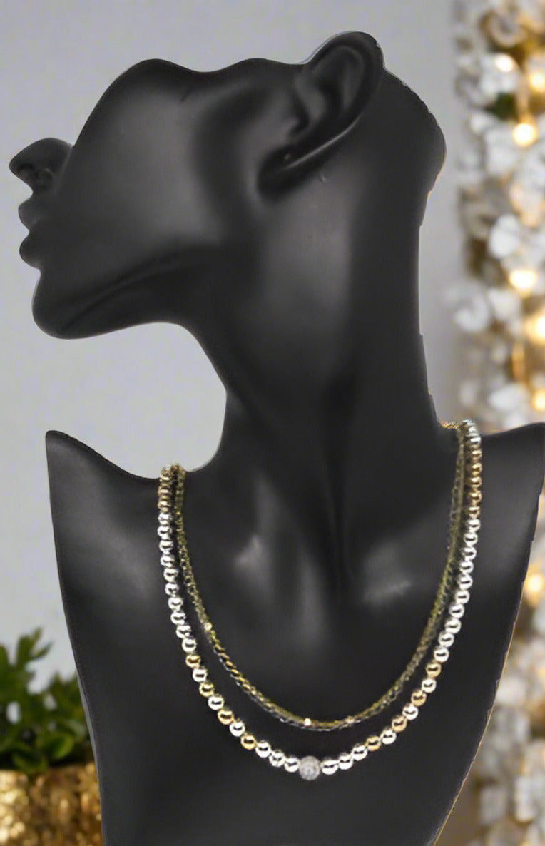 https://www.artistryjewelry.net/products/beautiful-silver-and-gold-hematite-necklace