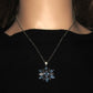 https://www.artistryjewelry.net/products/lovely-blue-winter-snowflake-necklace